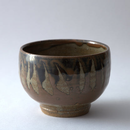 柿釉抜絵湯呑