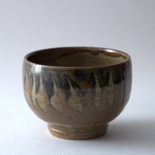 柿釉抜絵湯呑